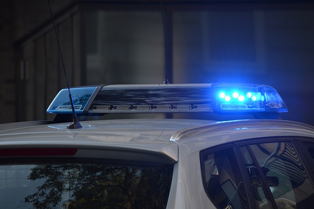 A close up of the blue sirens on top of a police car.